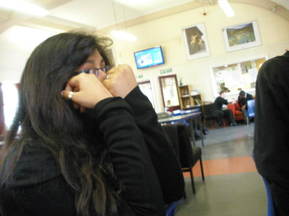 Nandini in high school (sixth form), hiding from life